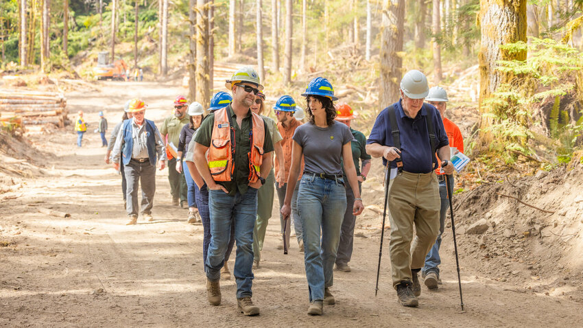 Congresswoman Marie Gluesenkamp Perez tours a timber sale with environmental groups, crews from the Department of Natural Resources, U.S. Forest Service officials and concerned citizens in the Gifford Pinchot National Forest on Thursday, Aug. 10, 2023.