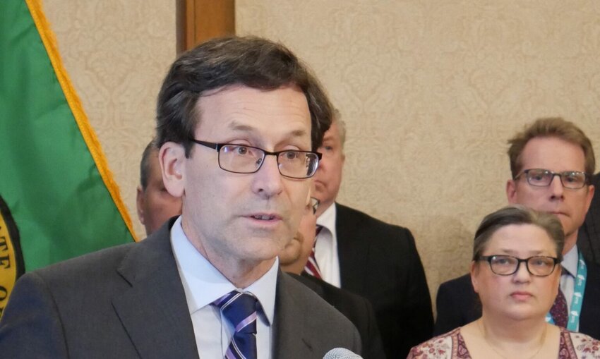 Bob Ferguson speaks at a press conference in February. (Photo by Bill Lucia/Washington State Standard)