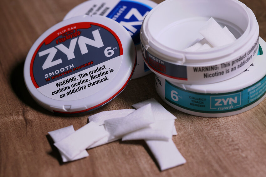 NEW YORK, NEW YORK - JANUARY 29:  In this photo illustration, ZYN nicotine cases and pouches are seen on a table on January 29, 2024 in New York City. Sen. Chuck Schumer (D-NY) is calling for federal action on ZYN, a popular nicotine pouch in the United States. The senator is asking the FTC and FDA to investigate the companies marketing and the health effects of the nicotine pouch.  (Photo Illustration by Michael M. Santiago/Getty Images)