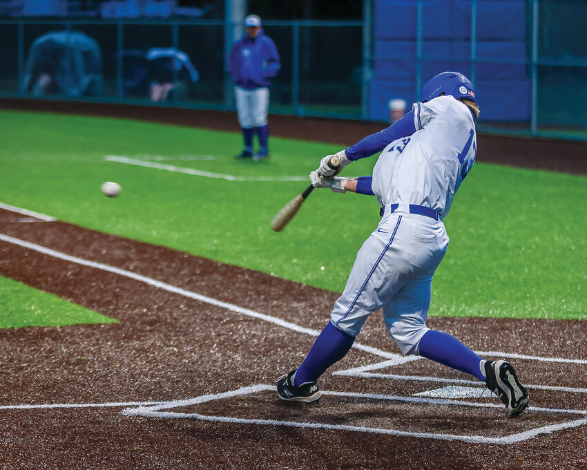 La Center&rsquo;s Houston Coyle hits the ball for a base hit in the Wildcats&rsquo; 12-6 win over Shelton High School in the Baseballism Kickoff Classic on Friday, March 22.