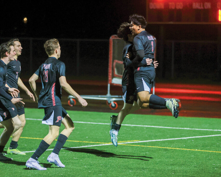 Prairie&rsquo;s Jayden Ramos, right, celebrates with his team after his early second half goal that was the eventual game winner in a 1-0 victory over the W.F. West Bearcats on Thursday, March 20.