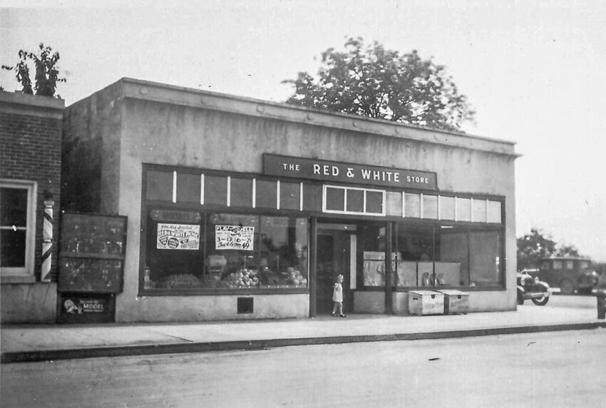 An undated photo of the Center Market building in the mid-20th century when it was known as the "Red &amp; White Store." The same building today (Bottom photo) has been modernized while retaining its historical charm. The building was constructed in 1925 and has been a cornerstone of downtown Ridgefield for decades.