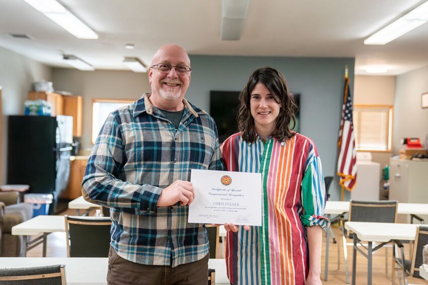 Chris Fuller, chief of Skamania County Fire District 4, smiles for a photo with U.S. Rep. Marie Gluesenkamp Perez, D-Skamania.