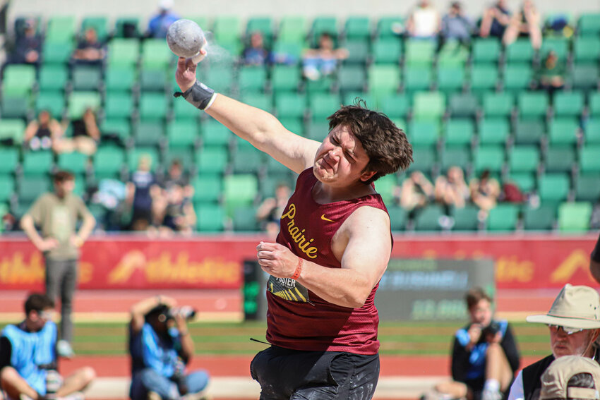 Smoke comes off of Prairie's Will Foster's fingertips as he throws the shot at the Oregon Relays at Hayward Field in Eugene, Oregon, on Friday, April 4.