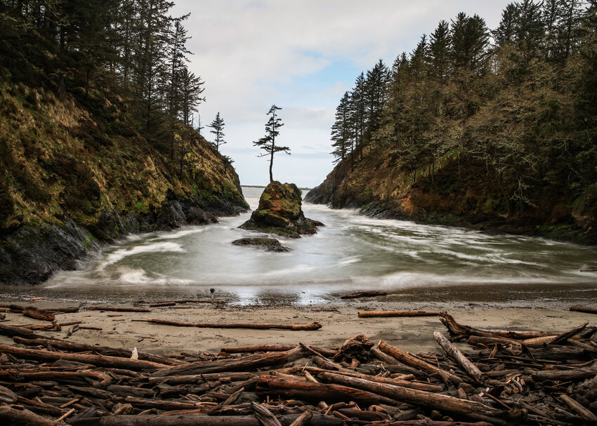 Deadman&rsquo;s Cove in Cape Disappointment State Park near Ilwaco churns swiftly where the mighty Columbia River meets the Pacific Ocean on Saturday, March 29. The abundance of drift wood leaves behind evidence of nasty high tides.