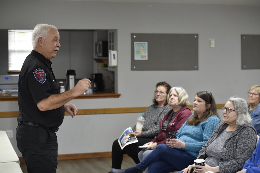 Fire inspector John Zanzi discusses fire prevention and fall risks with seniors at the Woodland Senior Enrichment Group on March 2. Zanzi provided important safety tips to the community, emphasizing the need for fire preparedness and fall prevention in the home.