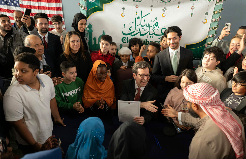 Gov. Bob Ferguson signs Senate Bill 5106, a bill to make Eid al-Fitr and Eid al-Adha state-recognized holidays. The bill signing was Tuesday, April 6, 2025 at the Islamic Center in Tacoma. (Photo Courtesy of governor&rsquo;s office)