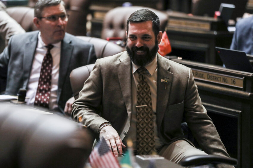 State Rep. Matt Marshall, R-Eatonville, speaks to other legislators during the 93 day of the legislative session on the House floor of the Washington state Capitol on Tuesday, April 15, 2025.
