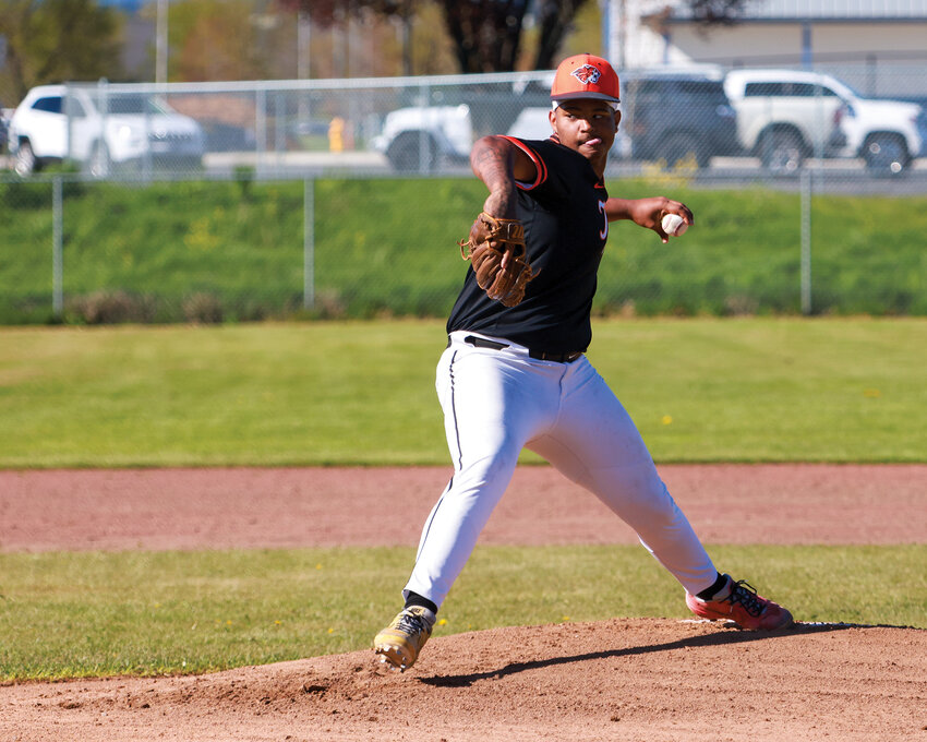 Battle Ground&rsquo;s James Gill III fires in a pitch during the Tigers&rsquo; 9-4 loss to the Camas Papermakers on Thursday, April 17.