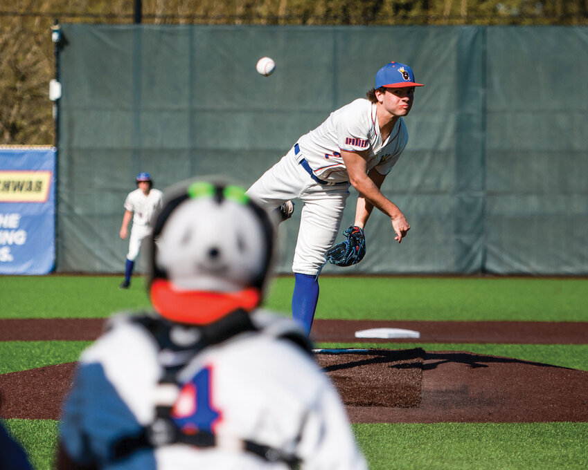 Ridgefield&rsquo;s Wyatt Hemmelman fires in a pitch during the Spudders&rsquo; 9-3 loss to the Columbia River Rapids on Wednesday, April 16.