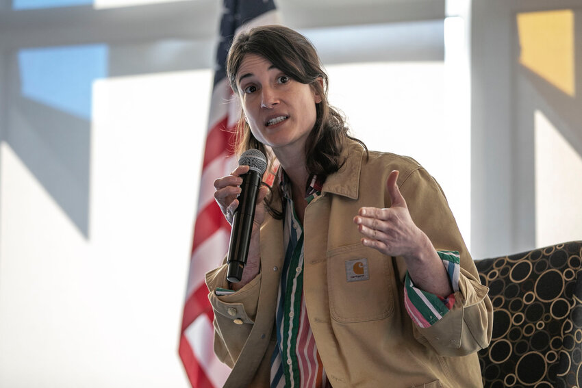 Congresswoman Marie Gluesenkamp Perez answers a question at a town hall in the TransAlta Commons at Centralia College on Tuesday, April 22.