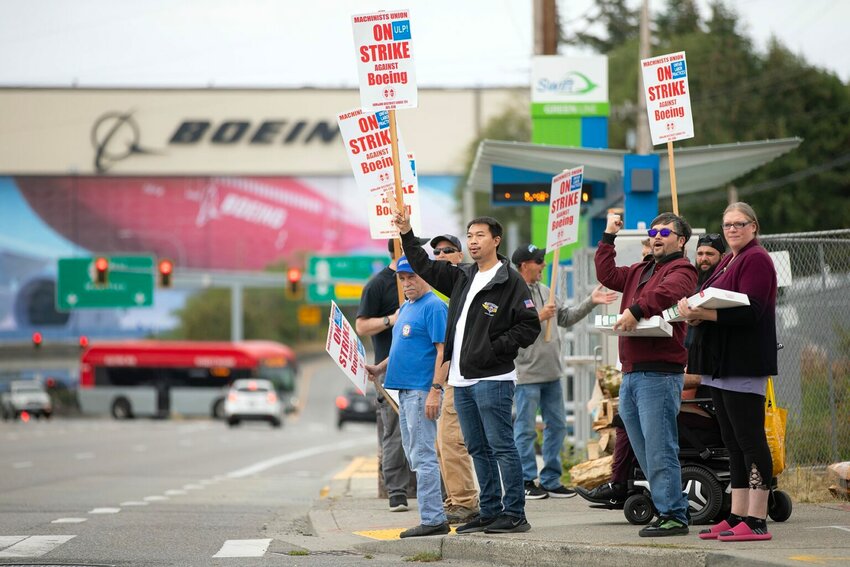 Boeing machinists take to the picket line in front of Boeing&rsquo;s Paine Field facility as thousands of IAM District 751 workers began their strike on Friday, Sep. 13, 2024, in Everett, Washington. (Photo by Ryan Berry/Washington State Stadnard)