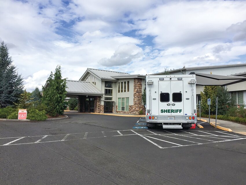 A vehicle from the Clark County Sheriff&rsquo;s Office sits in front of Daybreak Youth Services in Brush Prairie following the service of six search warrants that looked into possible sexual misconduct at the youth treatment center in September 2018.