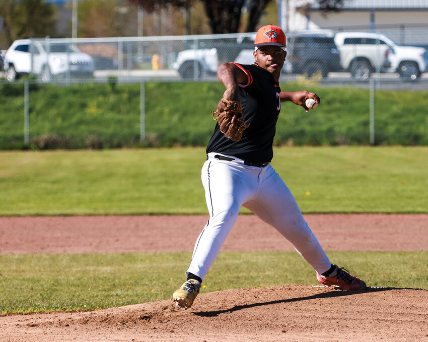 Battle Ground Tigers junior James Gill III throws a pitch in a previous 4A Greater St. Helens League matchup with Camas High School on Thursday, April 17.