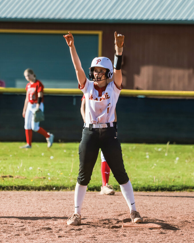 Prairie's Ashlee Porter celebrates after hitting a double in the Falcons' 4-0 win over Yelm High School on Thursday, April 24.