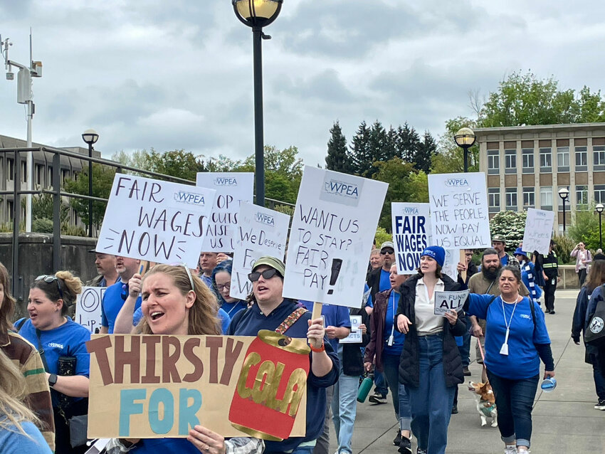 Members of the Washington Public Employees Association march at the 2025 public service recognition event at the state Capitol on May 7, 2025.