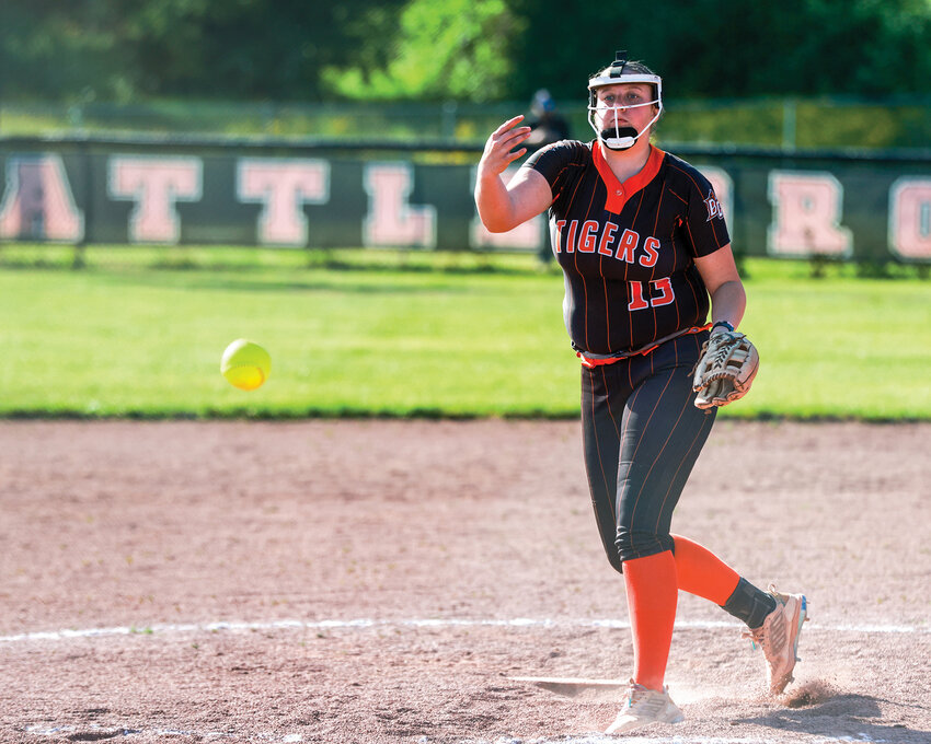 Battle Ground senior Mylee Burrows fires in a pitch during the Tigers' 7-1 senior night win against Union High School on Thursday, May 8.