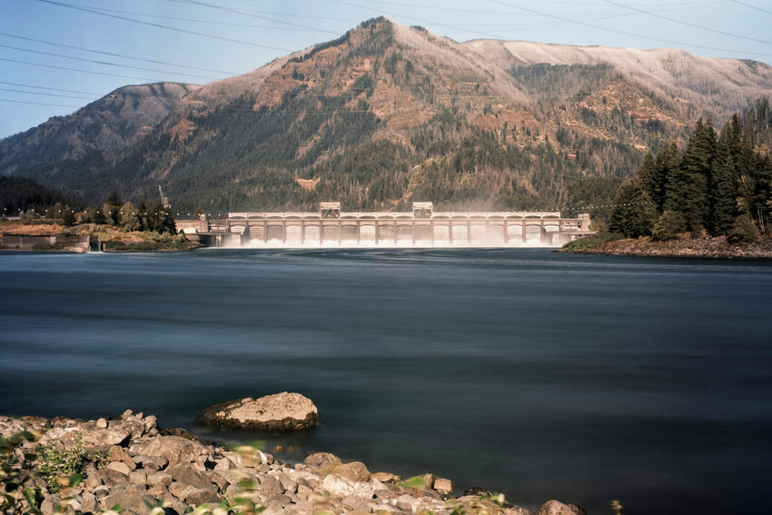Water flows out of the Bonneville Dam along the Columbia River, between Multnomah County, Oregon and Skamania County, Washington, on Tuesday, July 23, 2024. Photo by Jordan Gale.The Bonneville Dam system was the first hydroelectric infrastructure built on the Columbia River and is the last dam system downriver before the Columbia&rsquo;s water meets with the Pacific Ocean. At the time of its construction in 1938, it was the largest water impoundment project of its type in the nation. The Columbia River now exists as one of the most developed river systems in the world. From the headwaters of the river to the mouth, there are more than 60 operating hydroelectric dams that dot the water&rsquo;s mainstem..