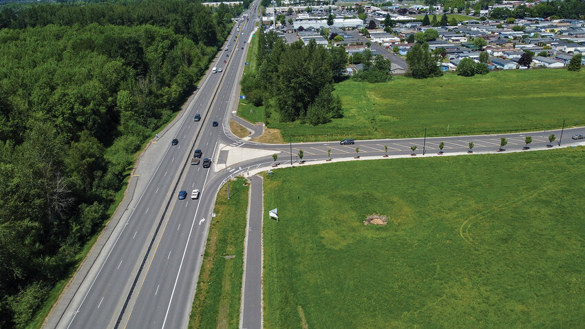 A concrete barrier divides traffic at the intersection of Highway 503 and Rasmussen Boulevard, which currently only connects to northbound traffic. A proposed roundabout at the site recently sparked debate online.