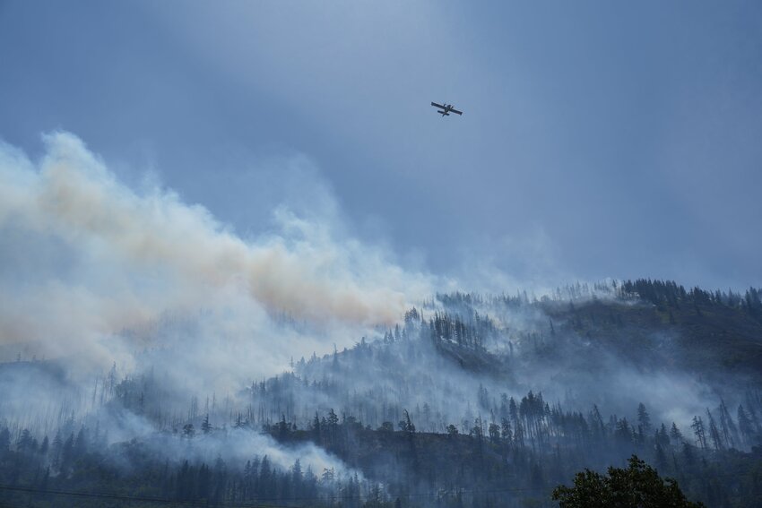 A wildfire continues to burn near Rowena in the Columbia Gorge on Thursday, June 12, 2025, forcing evacuations.