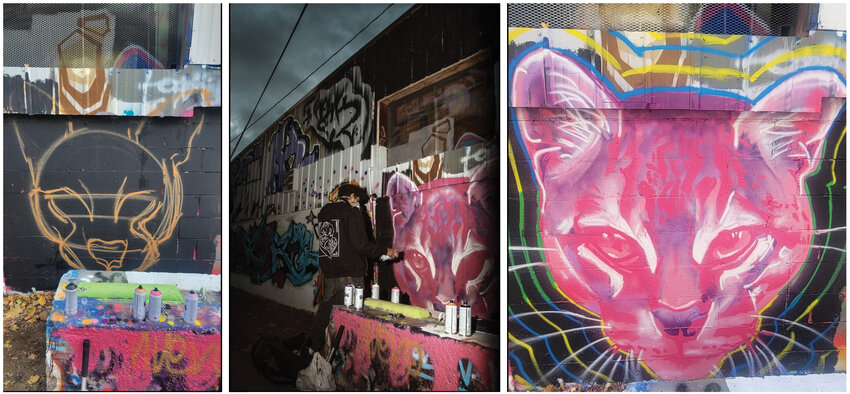 William Sykes (center) works on a previous mural project in the Pacific Northwest. He was selected as the city's first commissioned muralist and will begin painting a new piece at the Battle Ground Skate &amp; Bike Park in early July
