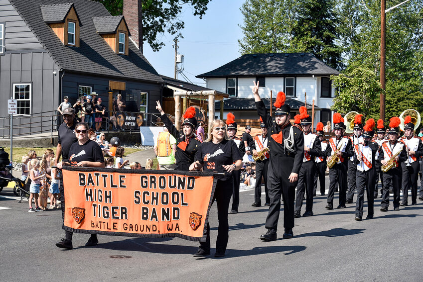 The Battle Ground High School marching band heads east down Main Street during the 2024 Harvest Days Parade.