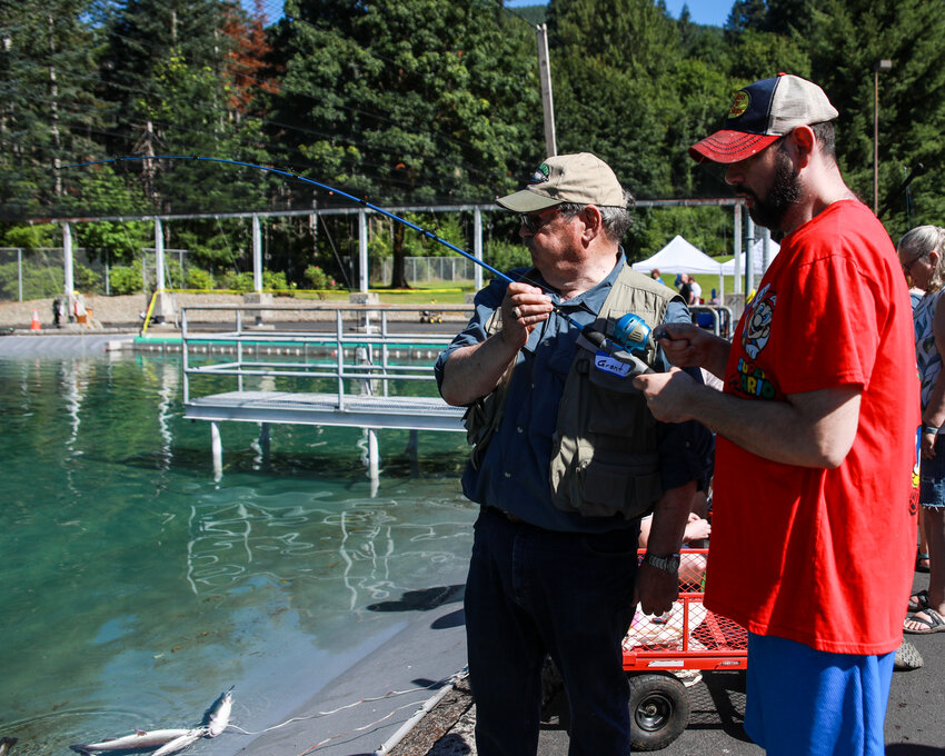 The 25th year of the Merwin Day of Fishing for Kids with Disabilities hosted by Pacific Power and the Washington Department of Fish and Wildlife (WDFW) drew a record turnout of over 300 participants from around Washington and Oregon to catch prized rainbow trout in the inclusive event on Saturday, July 12.