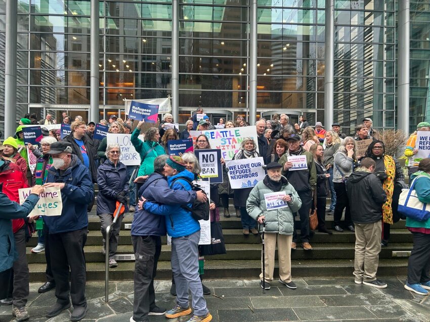 Opponents of President Donald Trump&rsquo;s executive order indefinitely halting refugee resettlement in the U.S. rally on the steps of the federal courthouse in Seattle on Feb. 25, 2025, after a judge issued a ruling blocking the president&rsquo;s order. (Photo by Jake Goldstein-Street/Washington State Standard)