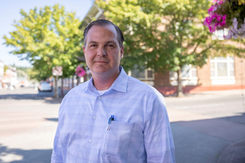 Sen. John Braun poses for a photo outside The Chronicle's former office in Centralia on Thursday, July 17.