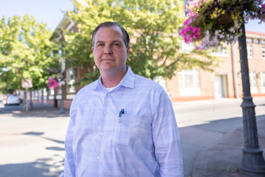 Sen. John Braun poses for a photo outside The Chronicle's former office in Centralia on Thursday, July 17.