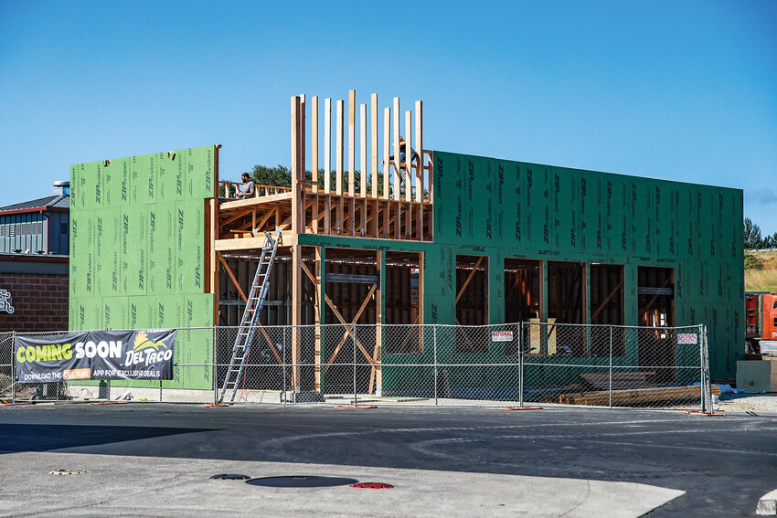 Construction of a new Del Taco in Woodland was underway on Thursday, July 24, near the existing Popeyes fast food restaurant.