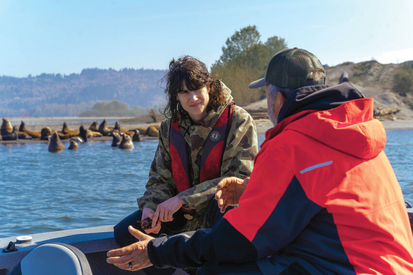 U.S. Rep. Marie Gluesenkamp Perez speaks with fishermen about growing sea lion populations on the Columbia River last year. She is requesting $1,031,000 in federal funding to support sea lion mitigation and salmon protection efforts in the lower Columbia.