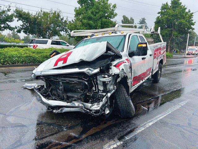 The driver of this tow truck allegedly disregarded a red light, leading to a four-car collision on Southeast Mill Plain Boulevard and 160th Avenue during rush hour traffic in Vancouver on Wednesday, Aug. 6.