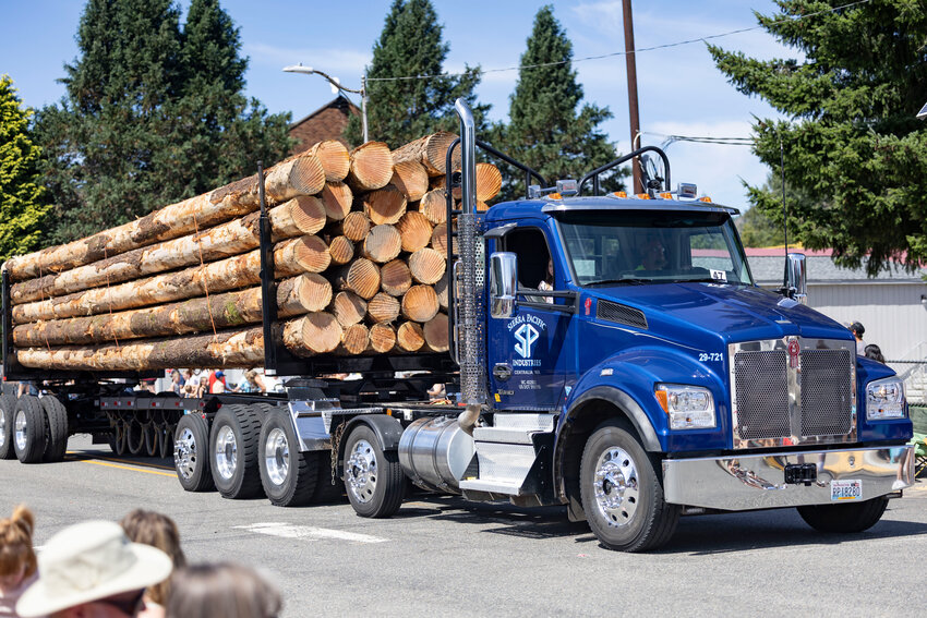 A Sierra Pacific Industries logging truck drives through during the Loggers Jubilee Parade in Morton on Saturday, Aug. 9.