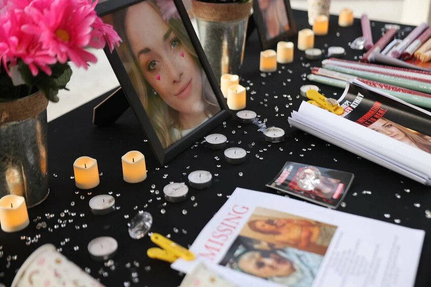A photo of Hailey Athay, who has been missing for about nine months, at vigil at R.A. Long Memorial Park on Thursday, Aug. 28, in Longview.