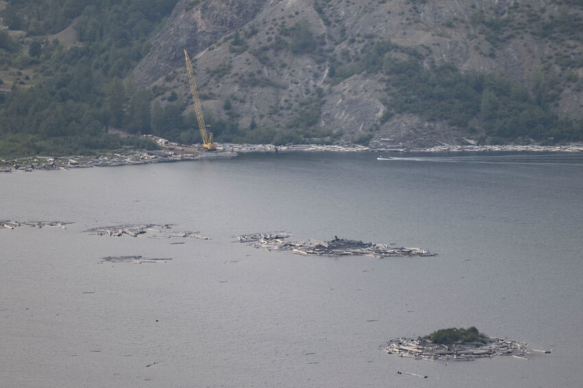 A boat and construction crew can be seen working from across Spirit Lake at the Windy Ridge Trail on Wednesday, Sept. 3.