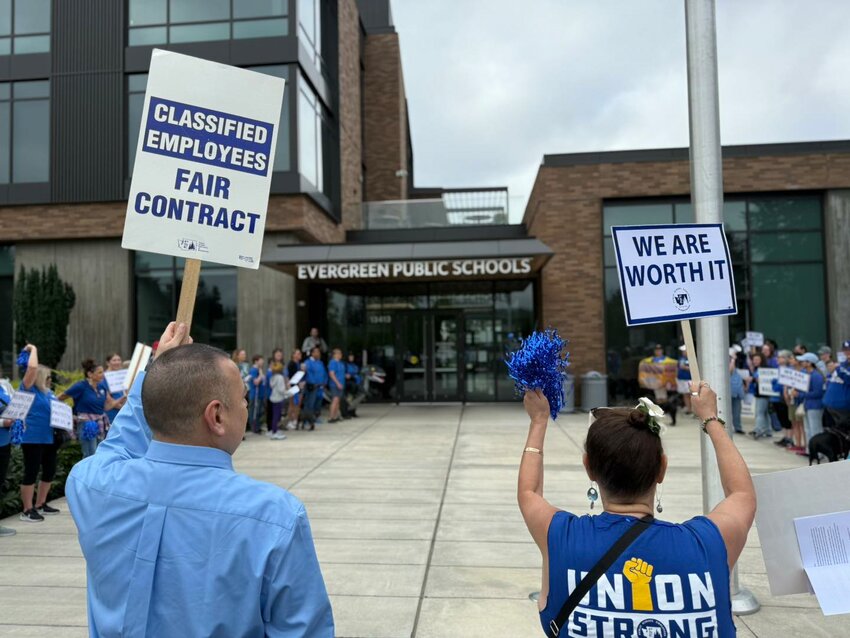 Members of the Evergreen chapter of Public School Employees of Washington and their supporters rally outside the Evergreen Public Schools district office on Aug. 20. (Photo courtesy of Public School Employees of Washington.)
