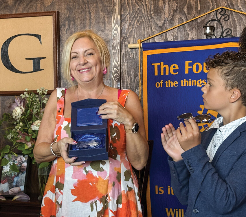 Battle Ground Rotary Club founding member and insurance professional with her agency, Your Insurance Gal, Stacey Johnson, was awarded the highest award in Rotary, the Paul Harris Award, at a ceremony in July.