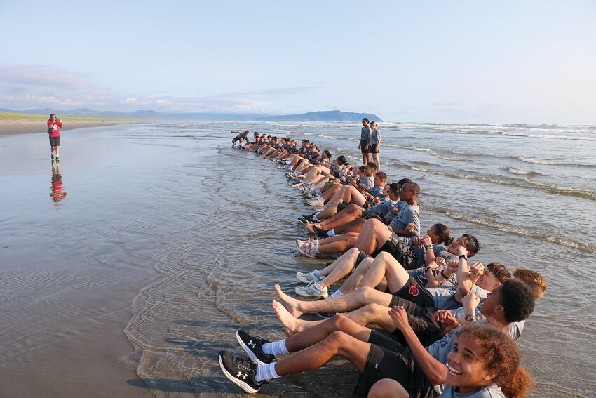 Young Marines at the 2025 National Leadership Academy at Camp Rilea take a dip in the Pacific Ocean during a &lsquo;Moto Run.&rsquo;