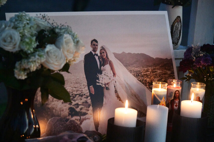 Charlie and Erika Kirk are pictured, surrounded by candle light, in a memorial just two days after the co-founder of Turning Point USA was assassinated in Utah.