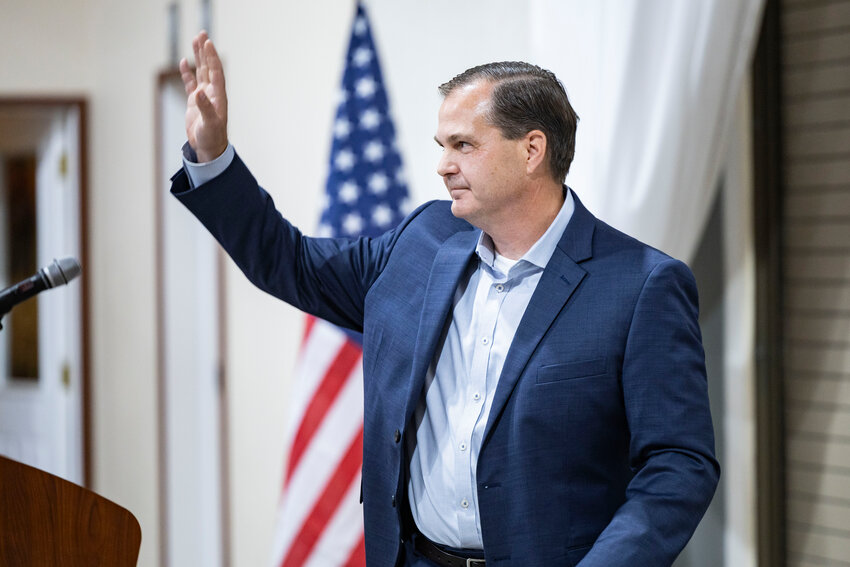 Washington state Sen. John Braun waves to the crowd during a fundraiser to kick off his congressional campaign at Jester Auto Museum on Thursday, Sept. 18.