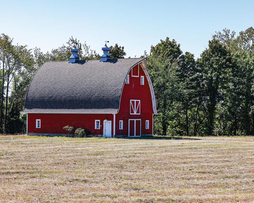 A historic red barn sits well preserved in the heavy agricultural area of Whipple Creek, south of Ridgefield, on a sunny afternoon on Tuesday, Sept. 16.