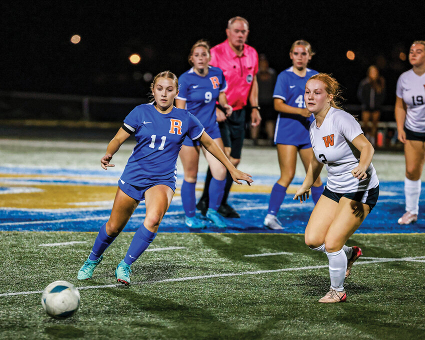 Ridgefield Spudder senior captain Ellie Wilson passes off the ball during the Spudders&rsquo; 2-0 league win over the Washougal Panthers on Thursday, Sept. 18.