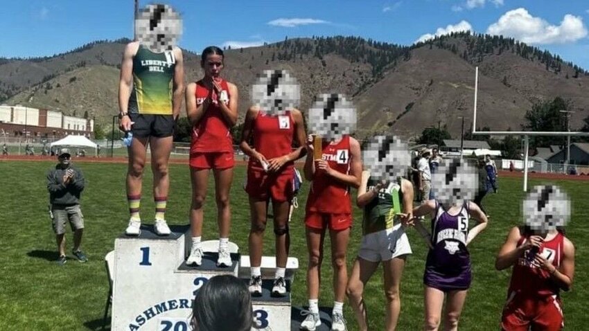 A photo of the winner's podium, captured by Elizabeth Wilson, mother of Ahnaleigh Wilson, who placed second. The faces of the other athletes are blurred as they are minors, and parental consent was not obtained.