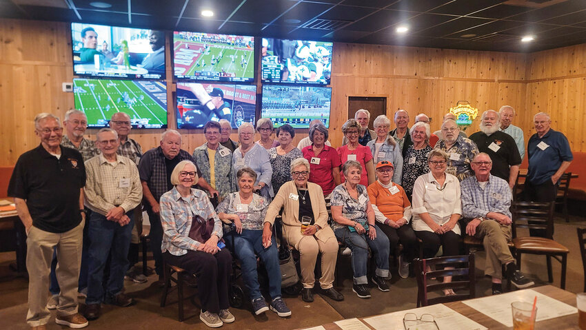The Battle Ground High School class of 1960 gathers for a class photo at their 65-year reunion on Saturday, Sept. 27, at Prairie Tavern.