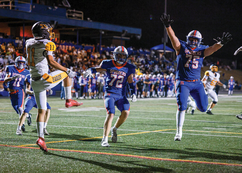 The Ridgefield Spudders almost block a punt during Ridgefield&rsquo;s 42-0 win over Hudson&rsquo;s Bay High School on Friday, Sept. 26.