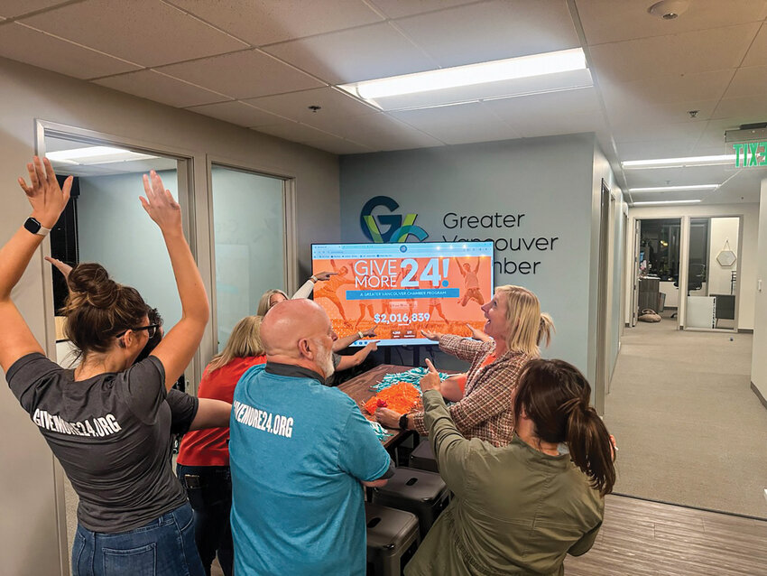 The Greater Vancouver Chamber team celebrates hitting $2 million for local organizations at 10:25 p.m. on Sept. 25. The fundraising milestone capped the first year back for Give More 24 after a two-year hiatus.