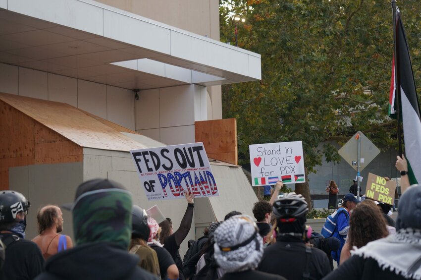 About 200 people showed up to protest outside the Immigration and Customs Enforcement building in Portland on Sunday, Sept. 28. (Photo by Alex Baumhardt/Oregon Capital Chronicle)