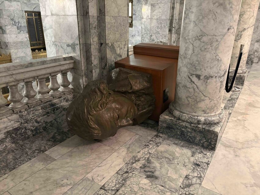 A bust of George Washington lies tipped over on the third floor of the Washington state Capitol building in Olympia, after a vandal broke in and caused damage on Sunday night. (Photo courtesy of Department of Enterprise Services)