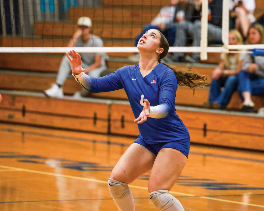 La Center setter Bailey Espana loads up to set the ball during the Wildcats&rsquo; 3-0 win over Kalama High School on Tuesday, Oct. 7.